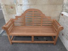 A teak Lutyens style garden bench