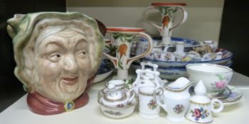 A quantity of ceramics to include Imari plates, Beswick character jug,