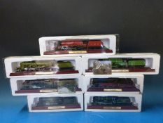 Twenty Corgi Matchbox and Lledo diecast model vehicles together with seven model locomotives (all