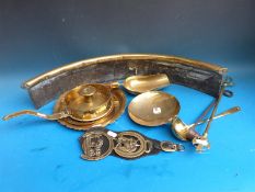 A 19thC brass fire fender, chamber stick,