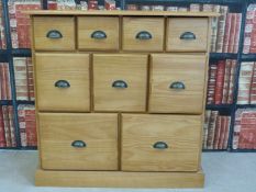 A pine haberdashery style nine drawer unit (W88 x D41 x H88cm)
