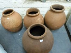 Four terracotta amphora/jardinieres,