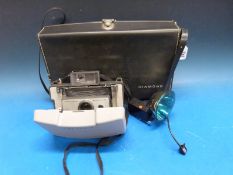 Polaroid Automatic 104 camera in 'Diamond' carrying case complete with flash and instructions