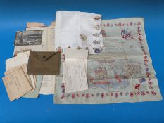 A quantity of military ephemera including WWI scarves, soldiers record book,