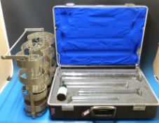 A set of three glass conical liquid flasks comprising 1/2 pint and one quart,