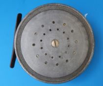 The Fred G Shaw Salmon fly fishing reel with brass foot.