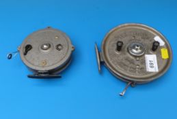 A Trudex centrepin fishing reel together with a Maxima example