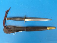 A 3rd pattern Fairbairn Sykes fighting knife in sheath