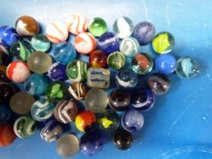 Approximately 150 early marbles including some with latticino decoration
