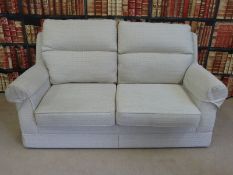 A Marks and Spencer two-seater sofa (purchased by vendor in July 2014),