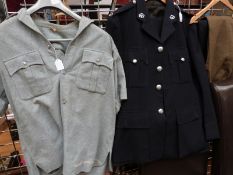 A collection of Northern Rhodesia Police uniform comprising two jackets, shirt and trousers,