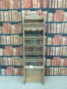 A rustic pine plate rack or sieve,