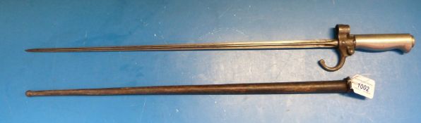 A c1886 French stick bayonet with white metal handle, 50633 stamped to guillon,