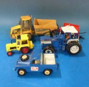 A collection of various loose diecast model vehicles
