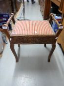 An early 20thC piano stool together with a small quantity of music, 1920s etc,