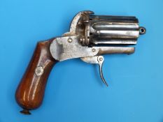 A 7mm pinfire six shot revolver, with folding trigger and mahogany grips, circa 1860.
