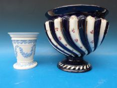 A Wedgwood embossed Queensware vase and a wrythen jardiniere