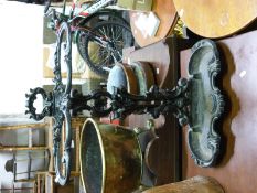 A cast umbrella stand