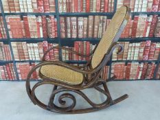 A bergere rocking chair