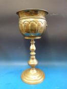 A brass jardiniere and stand (height 58.