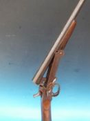 A .410 folding shotgun with skeleton stock NVSN.