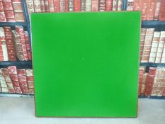 A green baize covered vintage collapsible games table