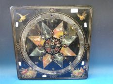 A slate quoits board with painted bird scenes and gilt decoration
