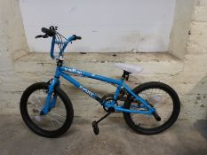 A blue child's bicycle,