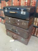A quantity of vintage suitcases and luggage