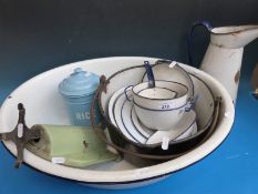 A collection of vintage enamel kitchenalia including child's bath/large basin