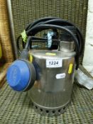 A Grundfors type KP150 water pump and hose