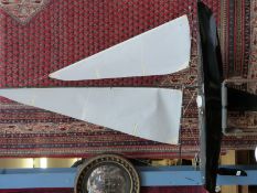 A large radio control fitted model yacht on stand