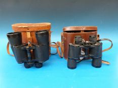 Two pairs of binoculars,