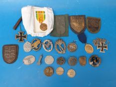 A quantity of Nazi German 1930s rally badges, replica SS,
