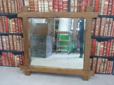 An oak bevelled edge mirror,