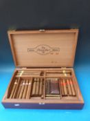 A large wooden cigar box containing 37 cigars, a quantity of smaller cigars including Le Ceiba,