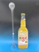 A Sol lager illuminated point of sale sign together with a glass yard of ale