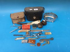 A quantity of collectables to include Chinon 7x35 binoculars, two serpentine lidded pots,