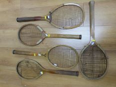 A group of five vintage tennis racquets including Spalding Speedwin, Kent Champion, Special No.