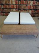Four wicker-type sofas or day beds together with two low tables