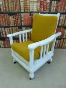 A white painted Art Nouveau reclining chair