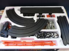 Two Aurora racing sets