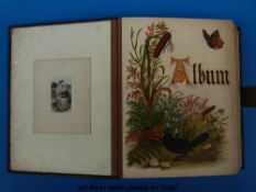 A Victorian metal-bound photograph album and contents including Cheltenham named examples
