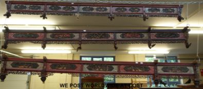 Three Chinese carved wooden friezes each set with five panels all decorated with figural scenes,