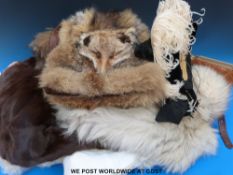 A collection of vintage fur items to include coats, handbag,
