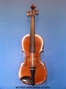 A circa 1900 probably German or Tyrolean cased violin (33.
