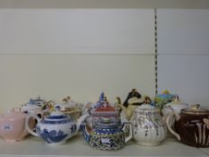 A collection of teapots including vintage Sadler examples