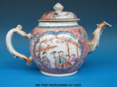 An 18thC Chinese Mandarin teapot with polychrome enamel figural decoration (15cm tall,