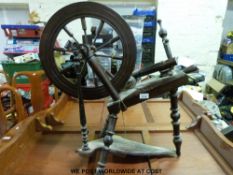 An 18th/19thC fruitwood spinning wheel