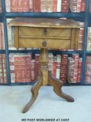 A 19thC walnut or possibly fruit wood worktable with two drawers raised on tripod base (w48 x d40 x